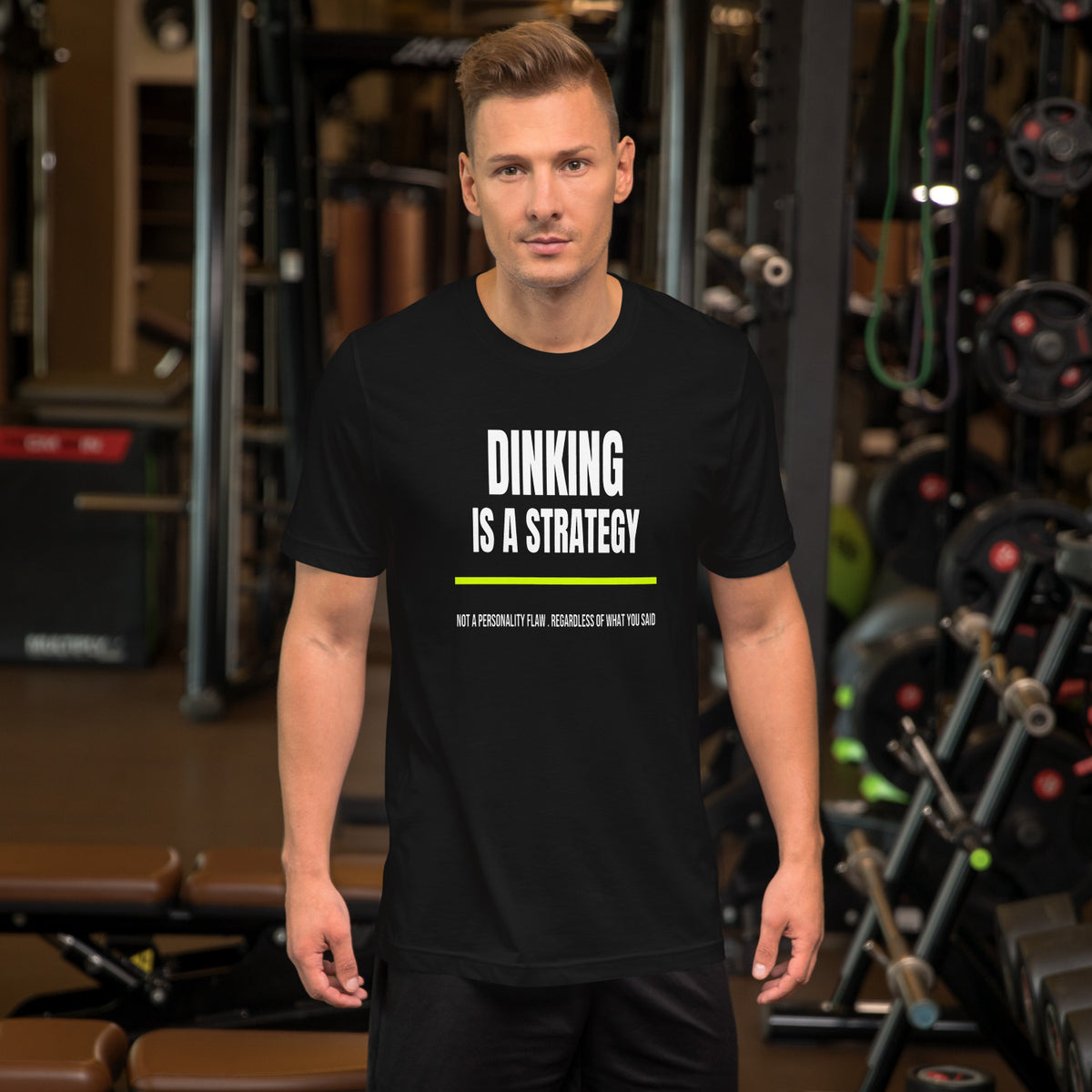 Dinking Is A Strategy black unisex t-shirt worn by a model -- pickleball court style
