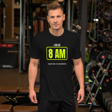 Eight Am Saturday Person black unisex t-shirt worn by a model -- pickleball court style