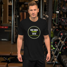 Heat Index Champion black unisex t-shirt worn by a model -- tennis court style