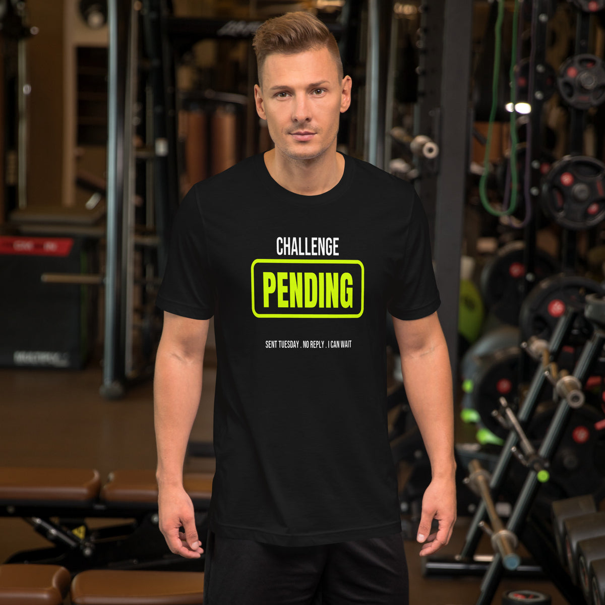 Ladder Challenge Pending black unisex t-shirt worn by a model -- tennis court style