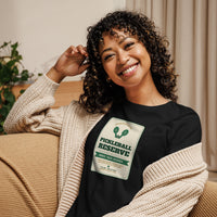 Pickleball Reserve black women's t-shirt worn by a model -- pickleball court style