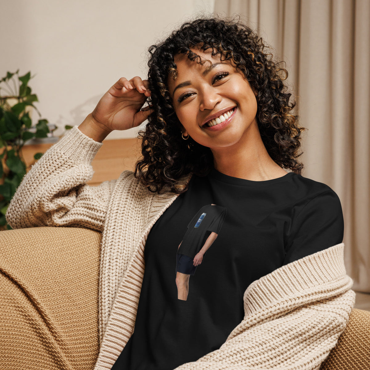 Tennis Light Blue Can black women's t-shirt worn by a model -- tennis court style