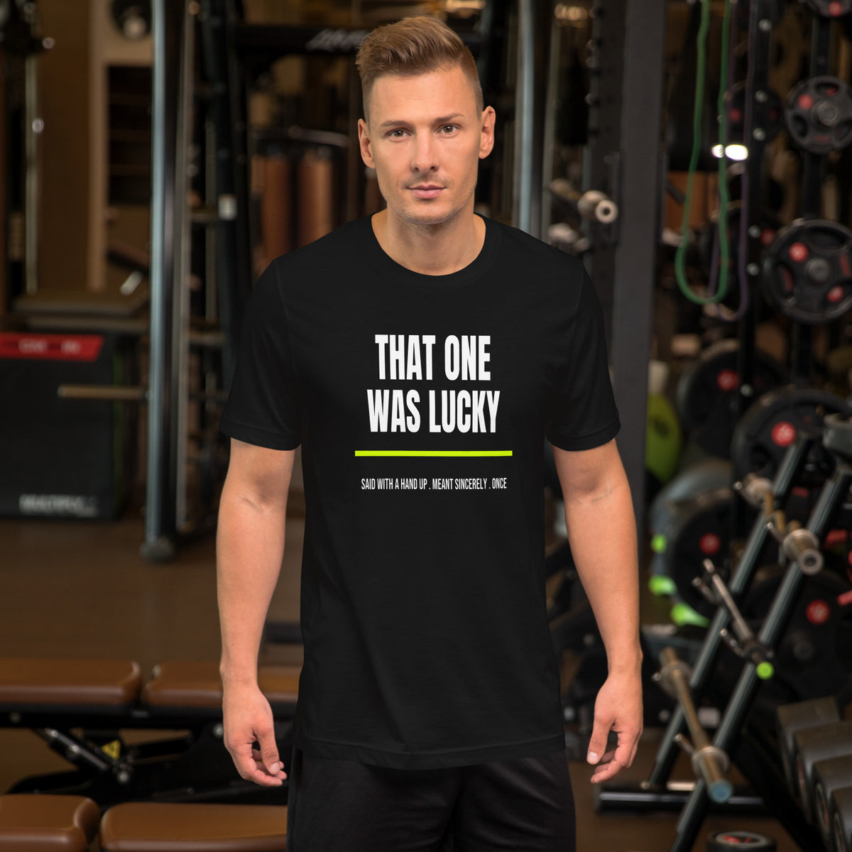 That One Was Lucky black unisex t-shirt worn by a model -- tennis court style