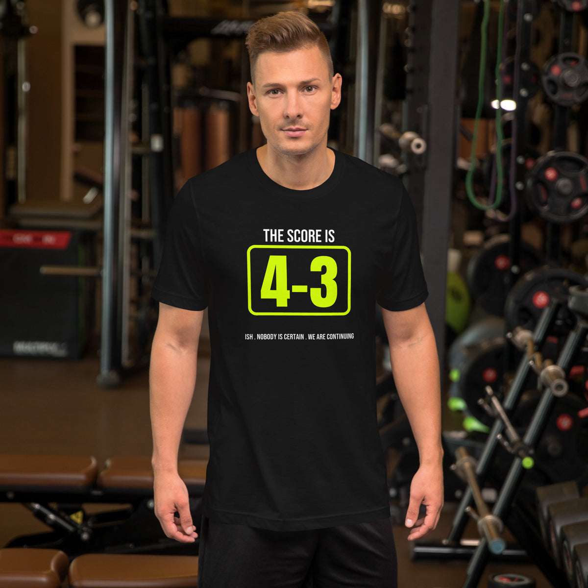 The Score Is Four Three Ish black unisex t-shirt worn by a model -- pickleball court style