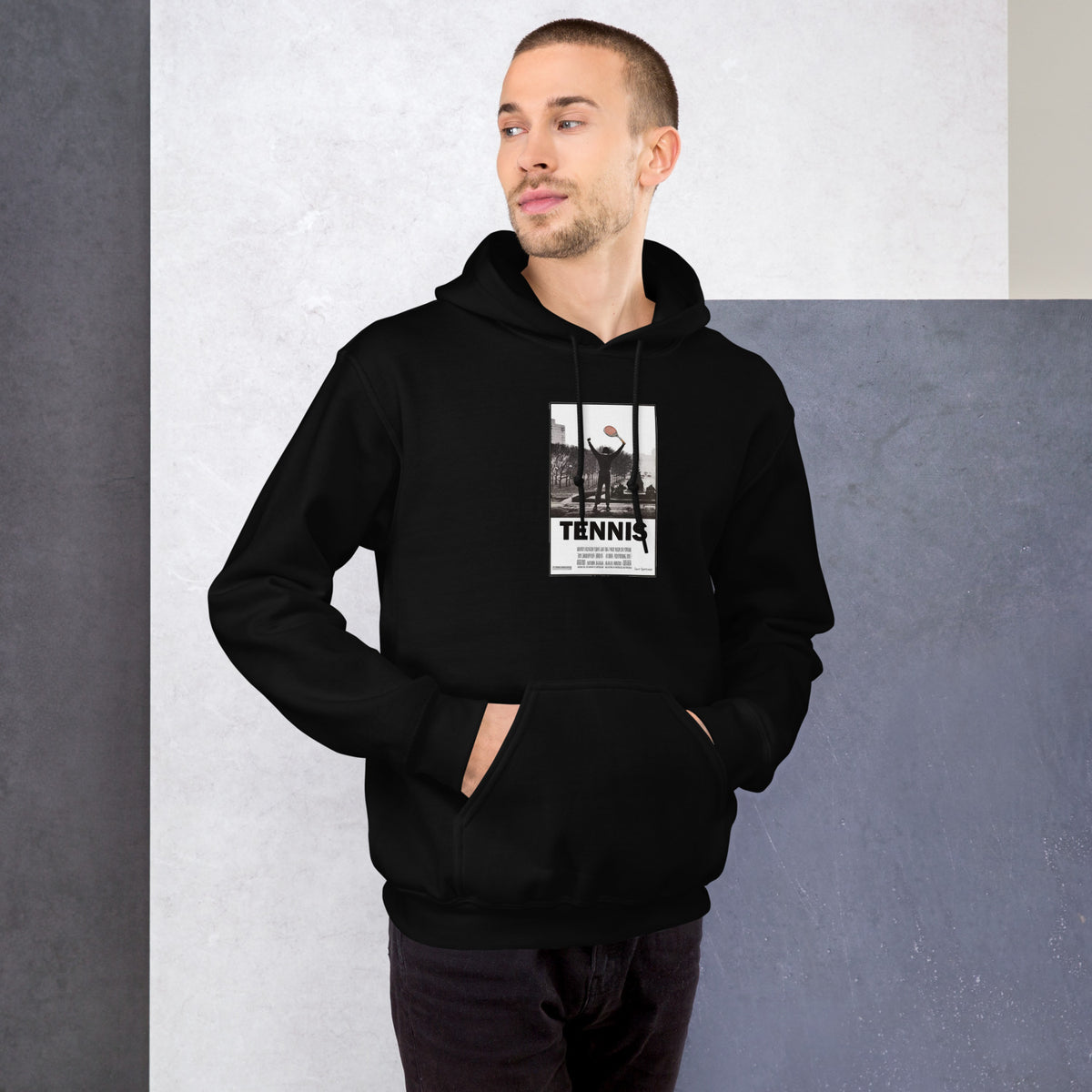 Victory Pose black hoodie worn by a model -- tennis court style